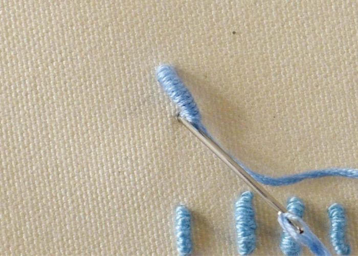 Ziehen Sie den gesamten Faden und beenden Sie den Stich.